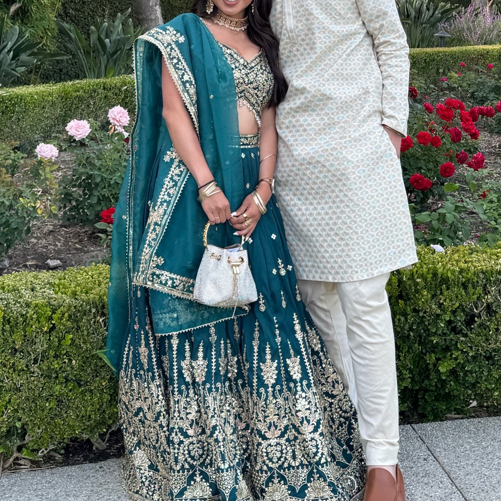 Lashkaraa teal green embroidered lehenga